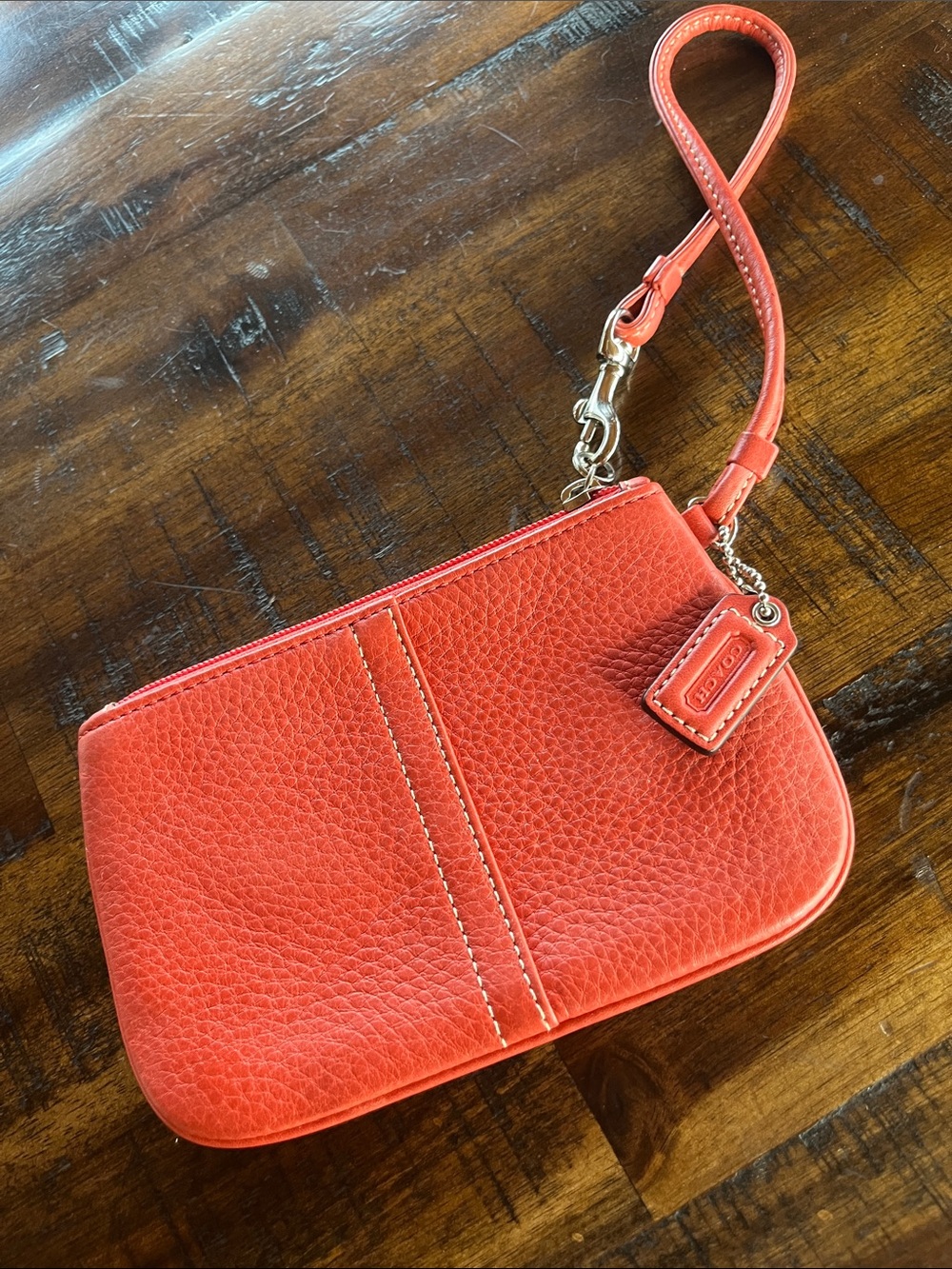 K/O Coach Coral Orange Pebbled Leather Wristlet